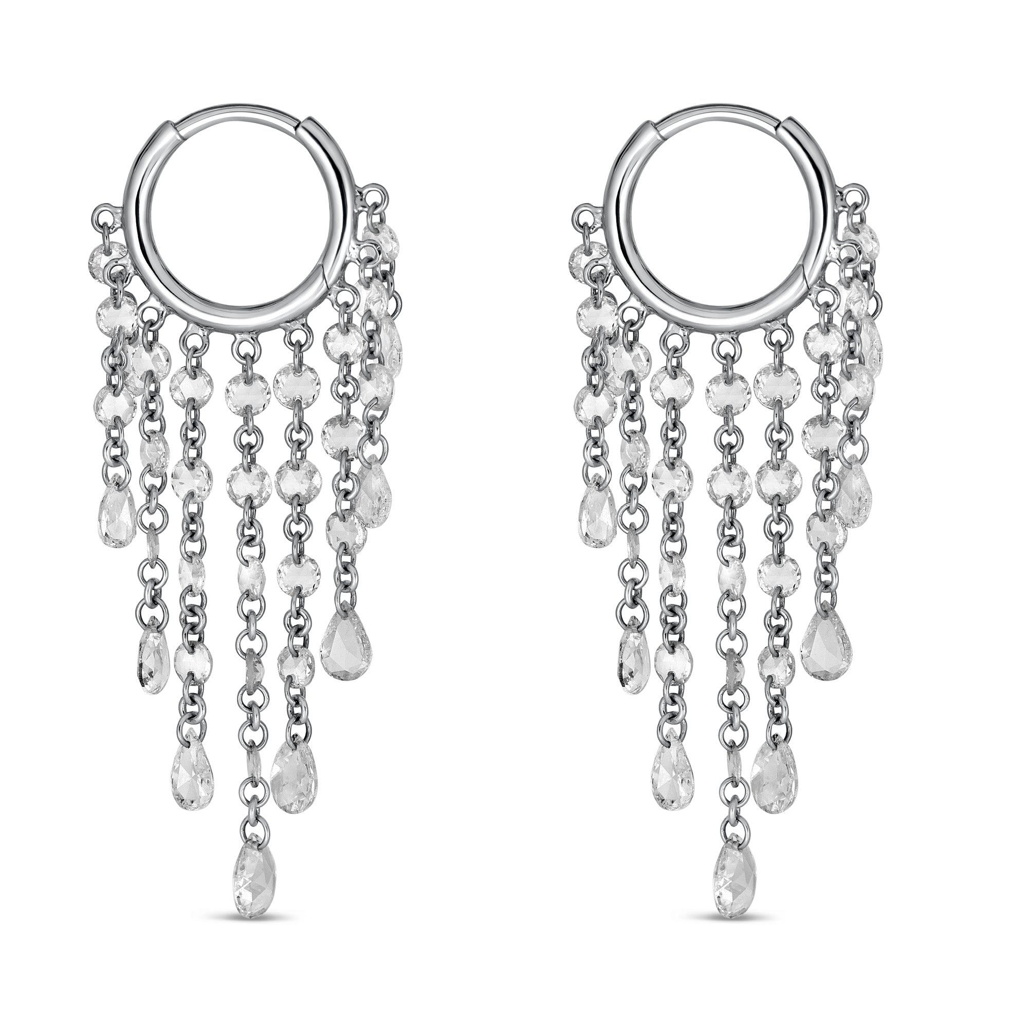 White gold hoop earrings with dangling chains of rose cut natural mined diamonds on a white background