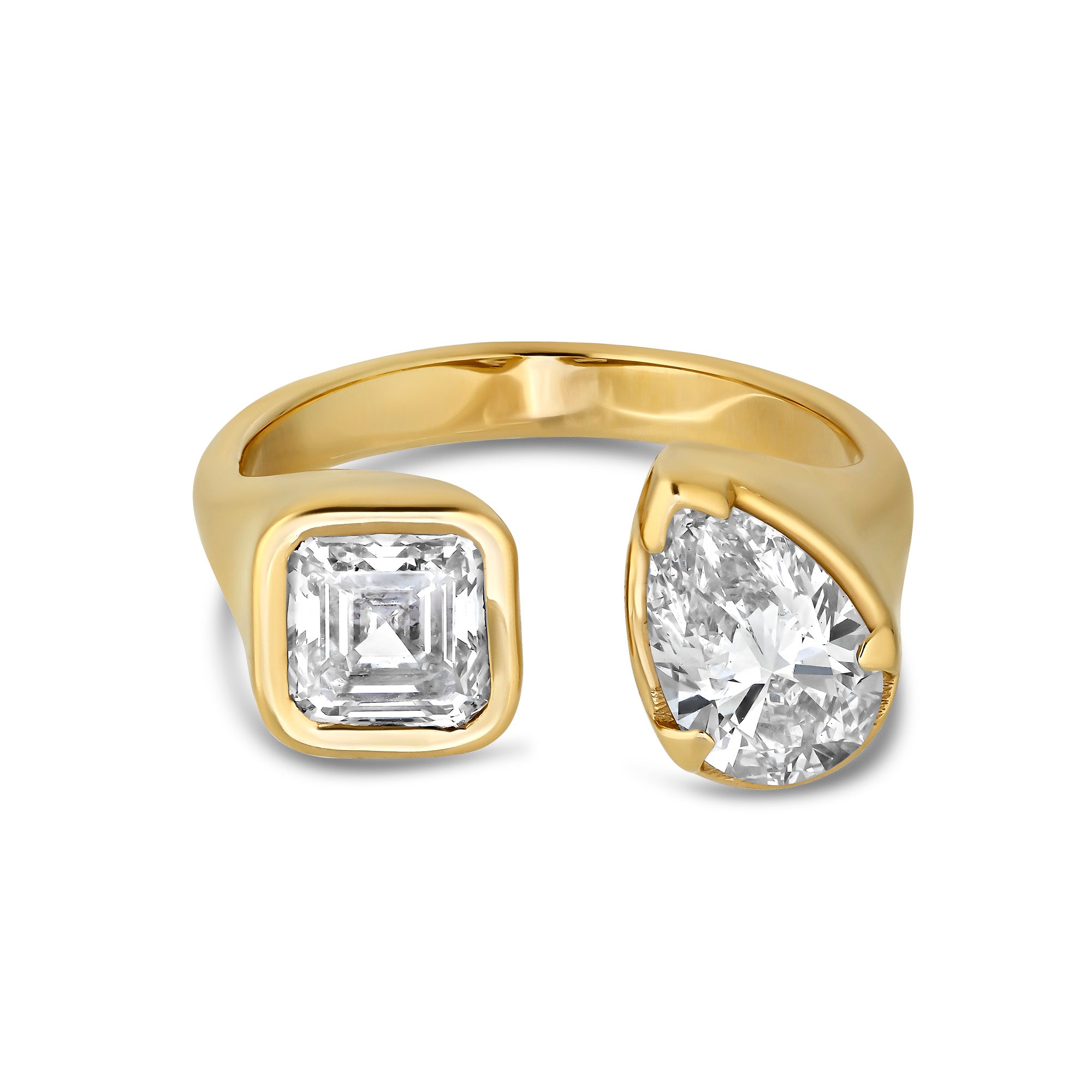 Toi Moi Lab Diamond ring set in 14k white gold. One radiant diamond and One Pear Diamond.