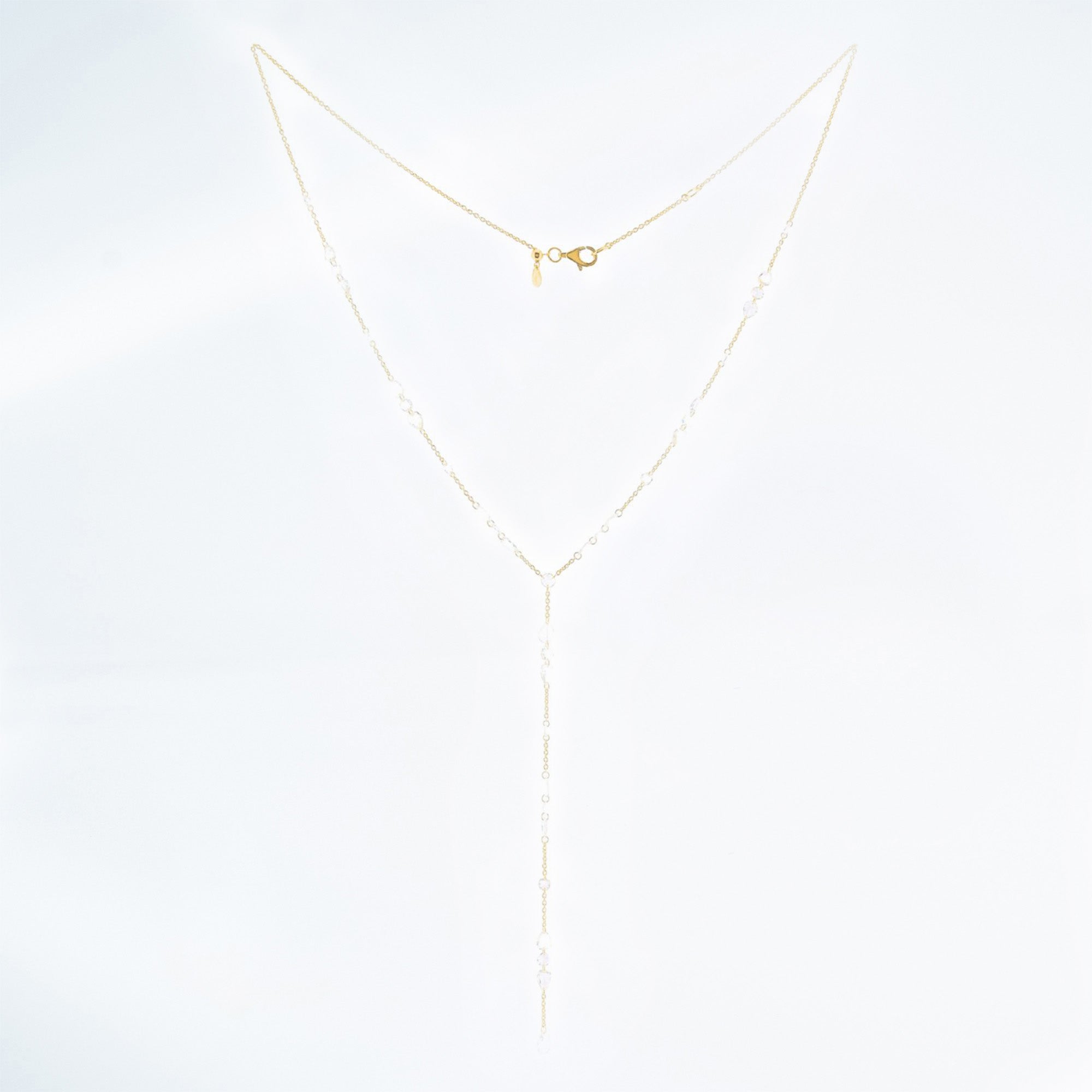 Gold necklace on a white background. Rose Cut Natural Mined Diamonds and 14k yellow gold.