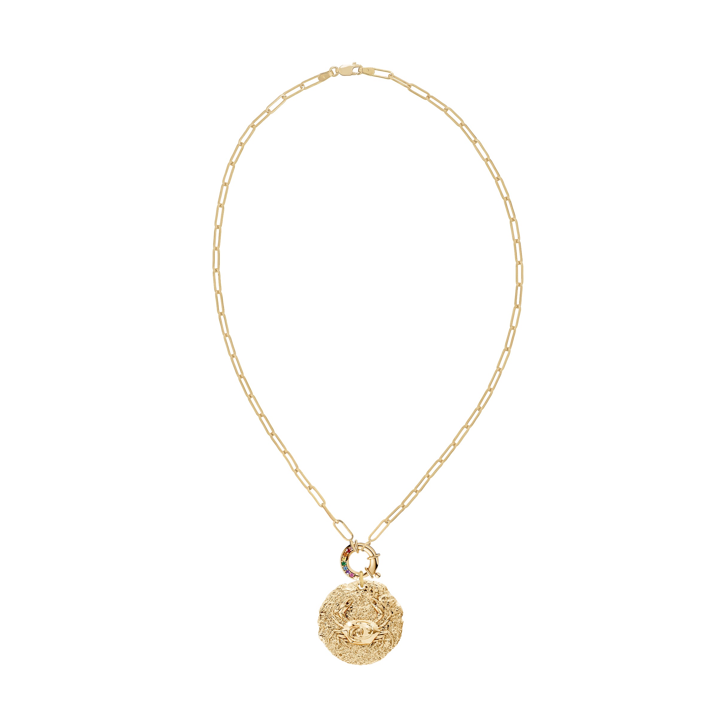Gold necklace with a round zodiac cancer pendant with crab design on rainbow sapphire decorative clasp on a white background