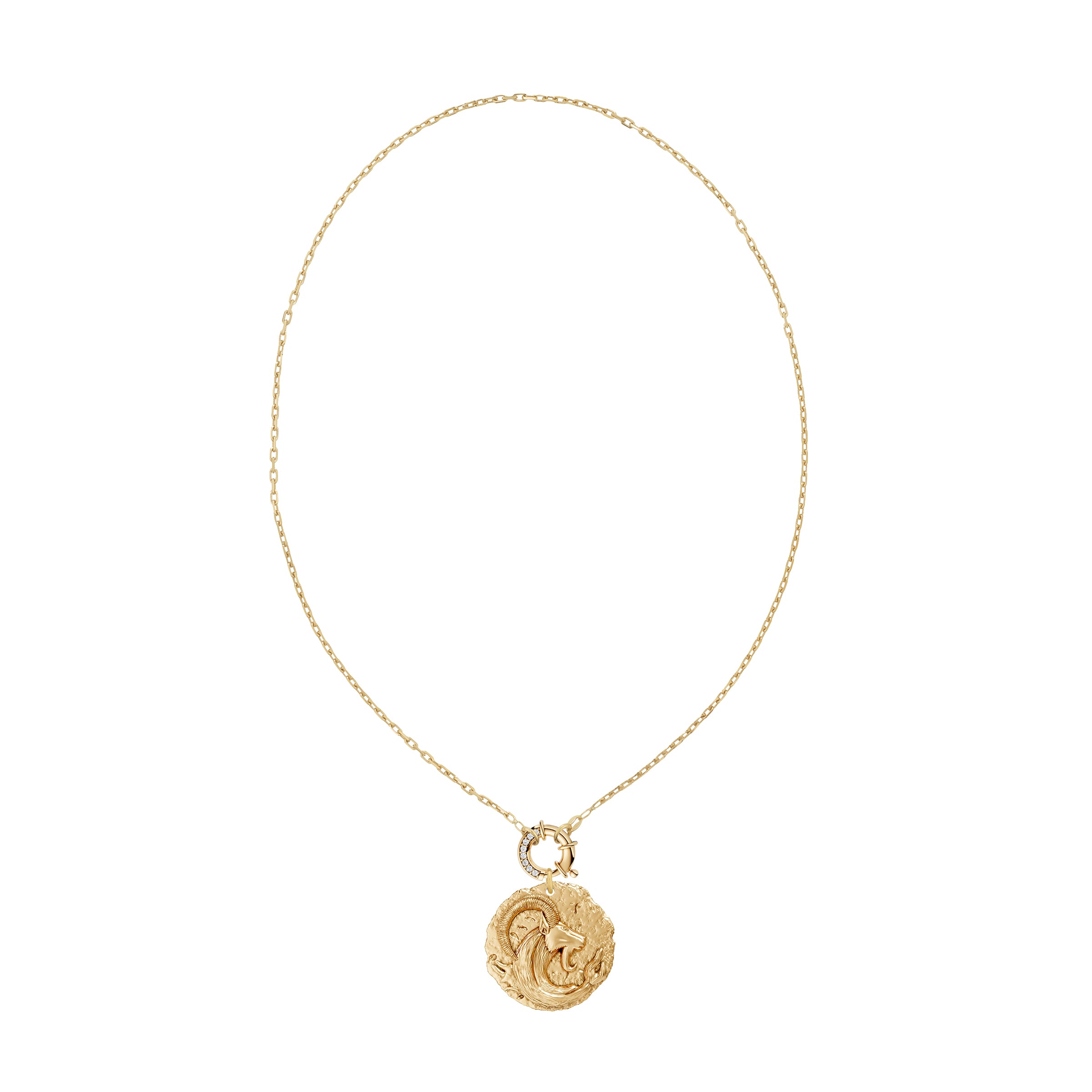 Gold necklace with a circular zodiac Capricorn pendant on a small link chain and a white diamond clasp on a white background