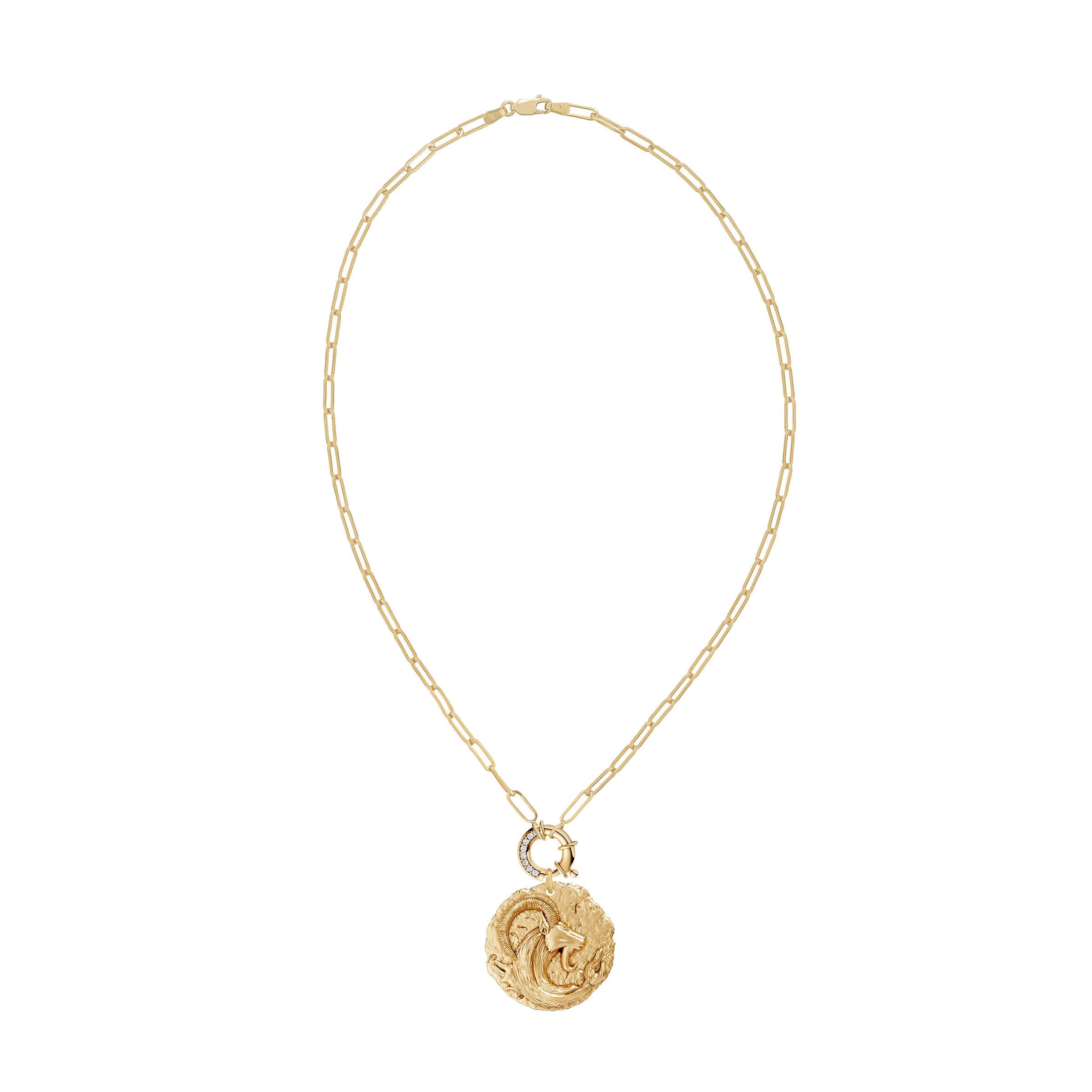 Gold necklace with a circular zodiac Capricorn pendant on a paperclip link chain and a white diamond clasp on a white background