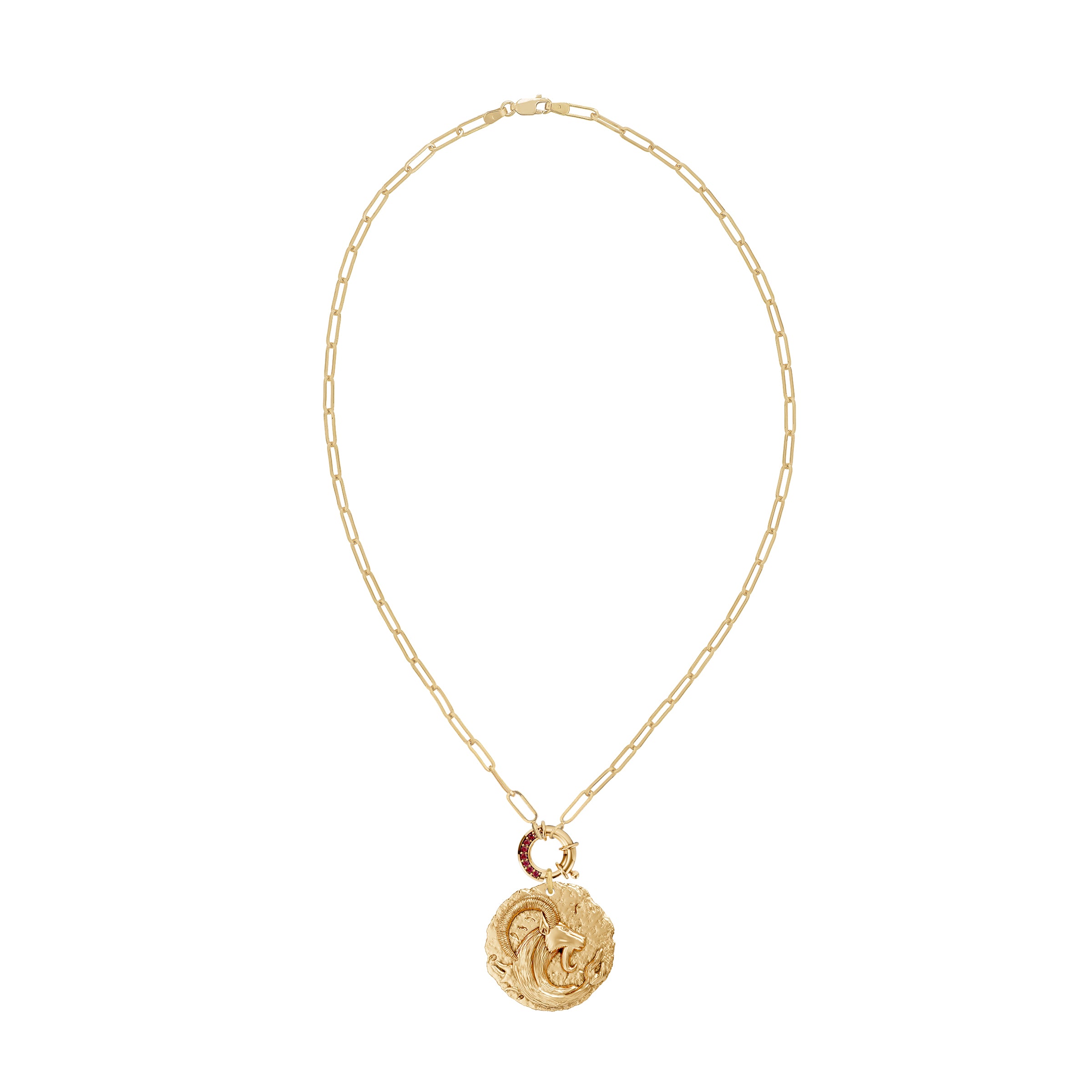 Gold necklace with a circular zodiac Capricorn pendant on a paperclip link chain and a ruby clasp on a white background