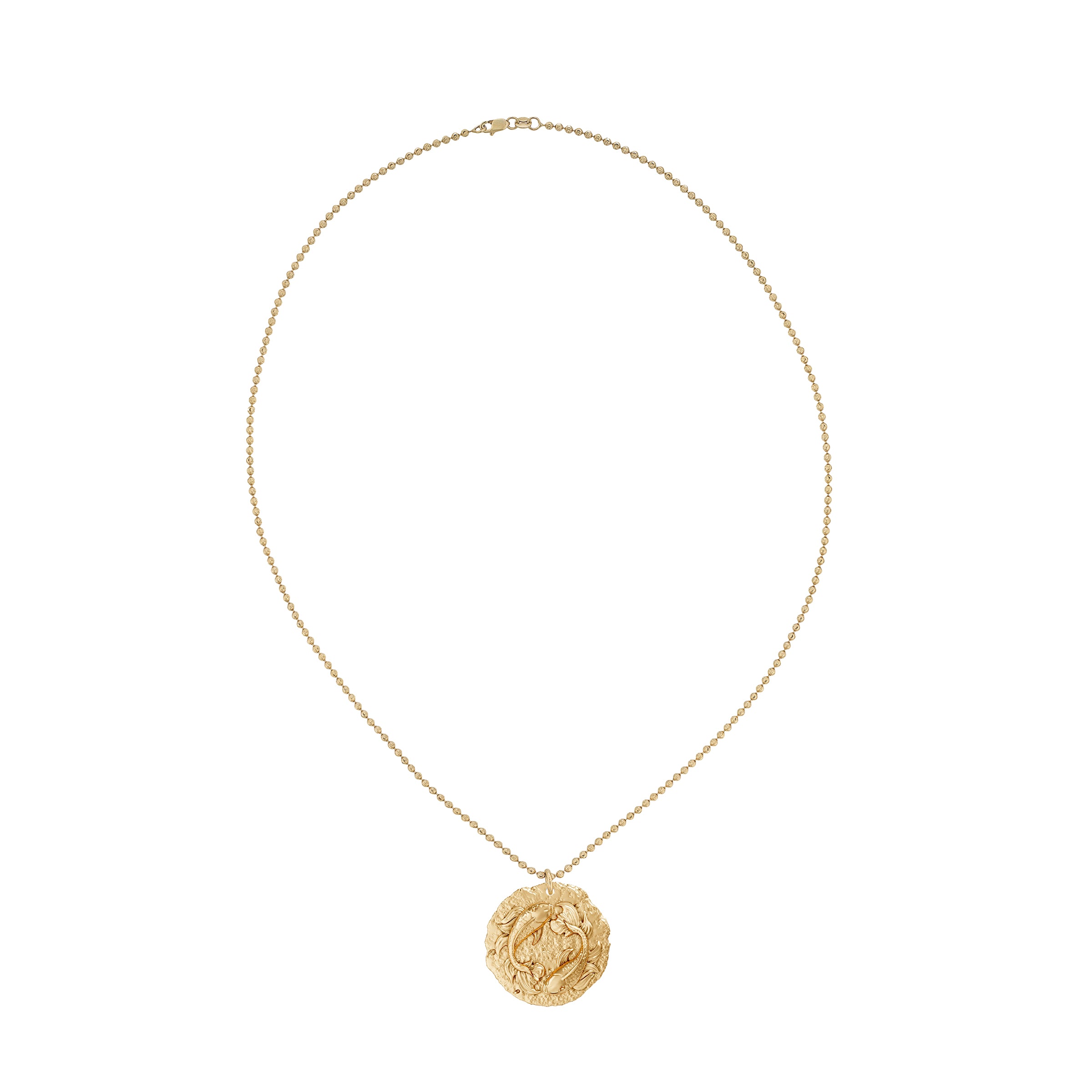 Gold chain necklace with a round Pisces Zodiac pendant on a white background