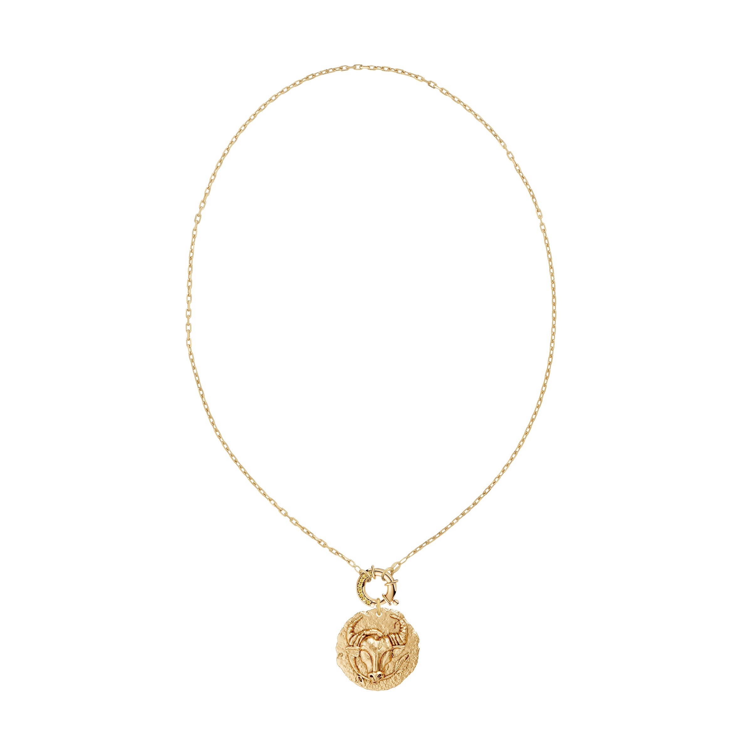 Gold necklace with a taurus zodiac pendant and a yellow diamond decorative clasp on a white background