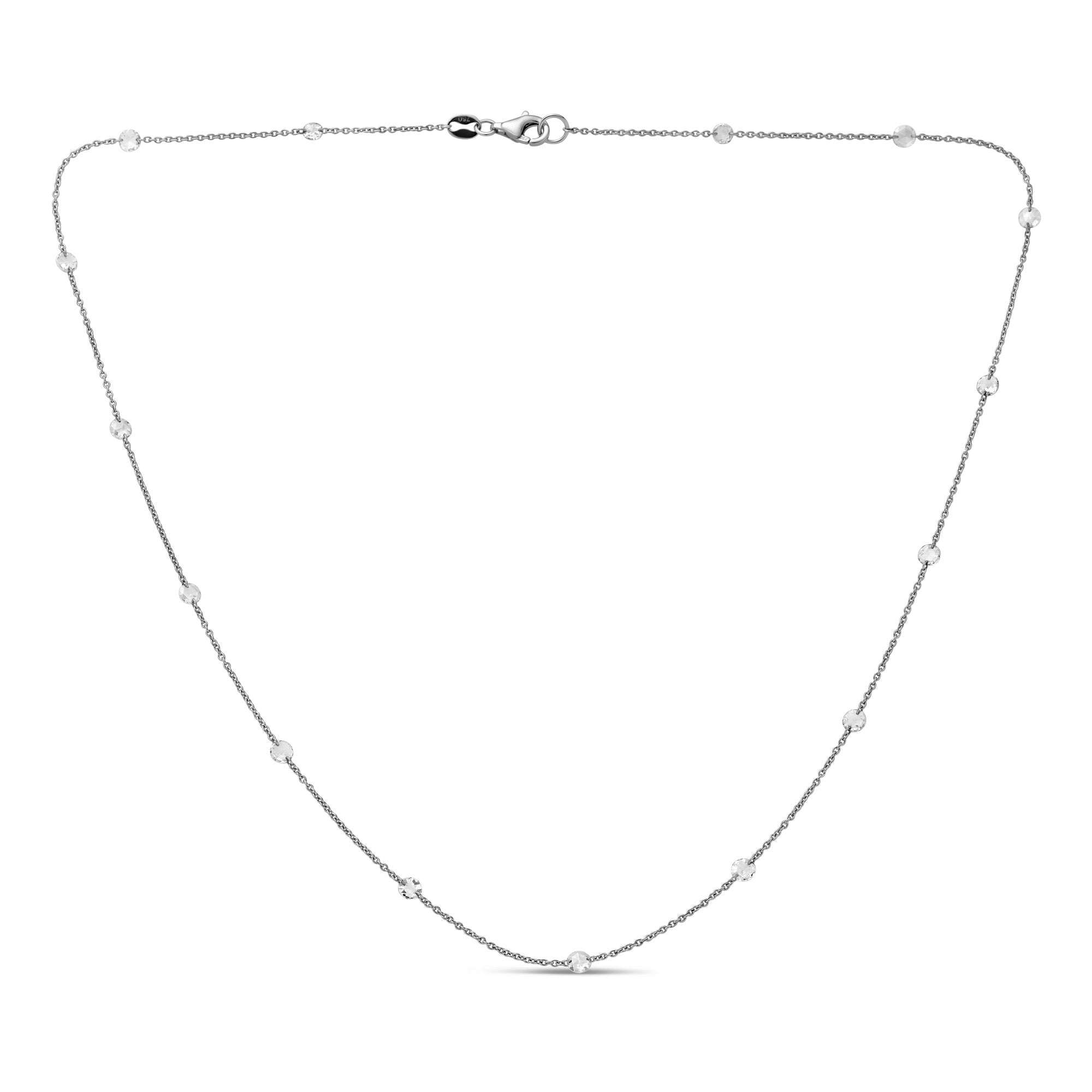 White gold chain necklace and rose cut diamonds on a white background