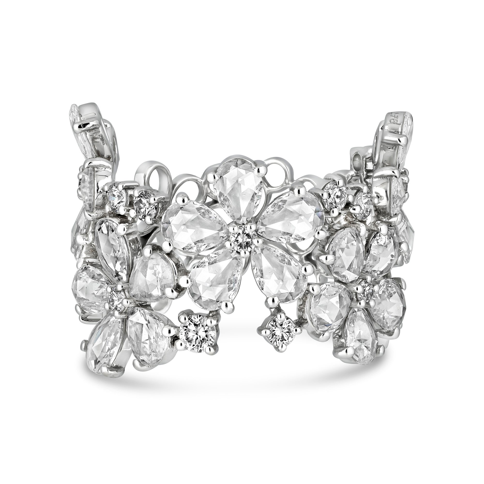 Wide diamond ring in 18k gold featuring clusters of rose-cut diamonds arranged in floral patterns, creating the look of a blooming garden around the band.