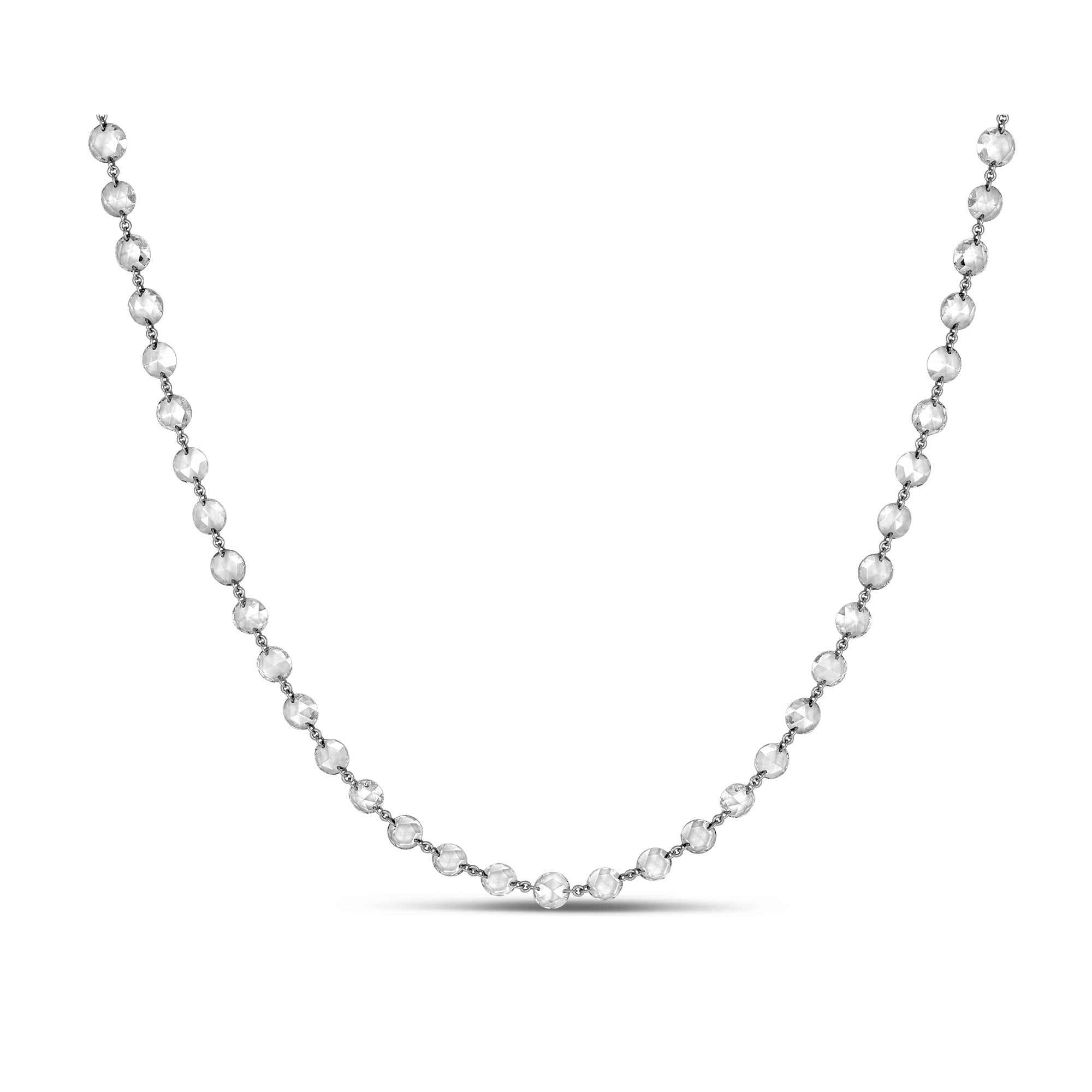 18k gold long station necklace featuring rose-cut diamonds spaced evenly along the chain, shown doubled for a layered look.