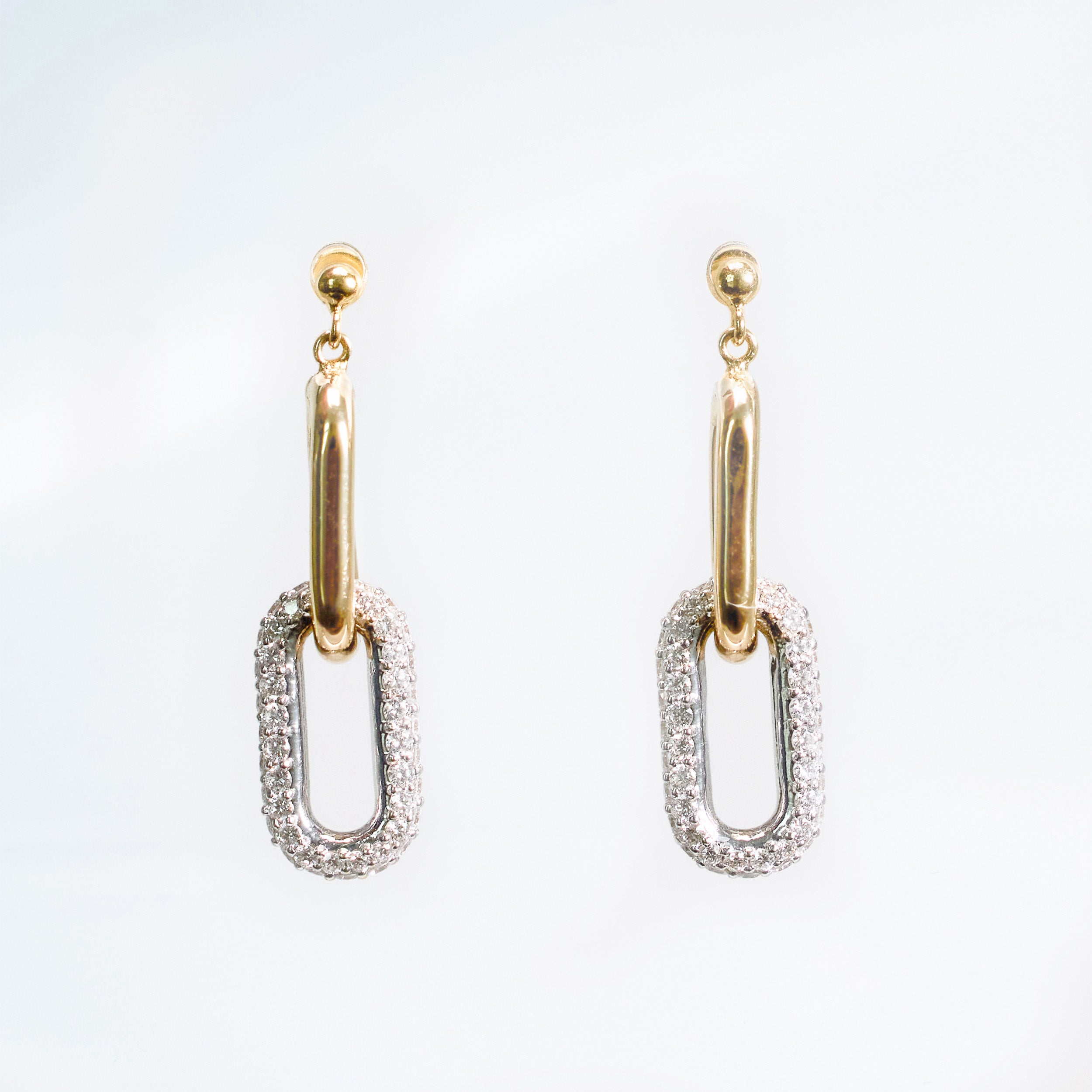 14k chain earrings with solid yellow gold link and pave natrual mined diamonds on link.