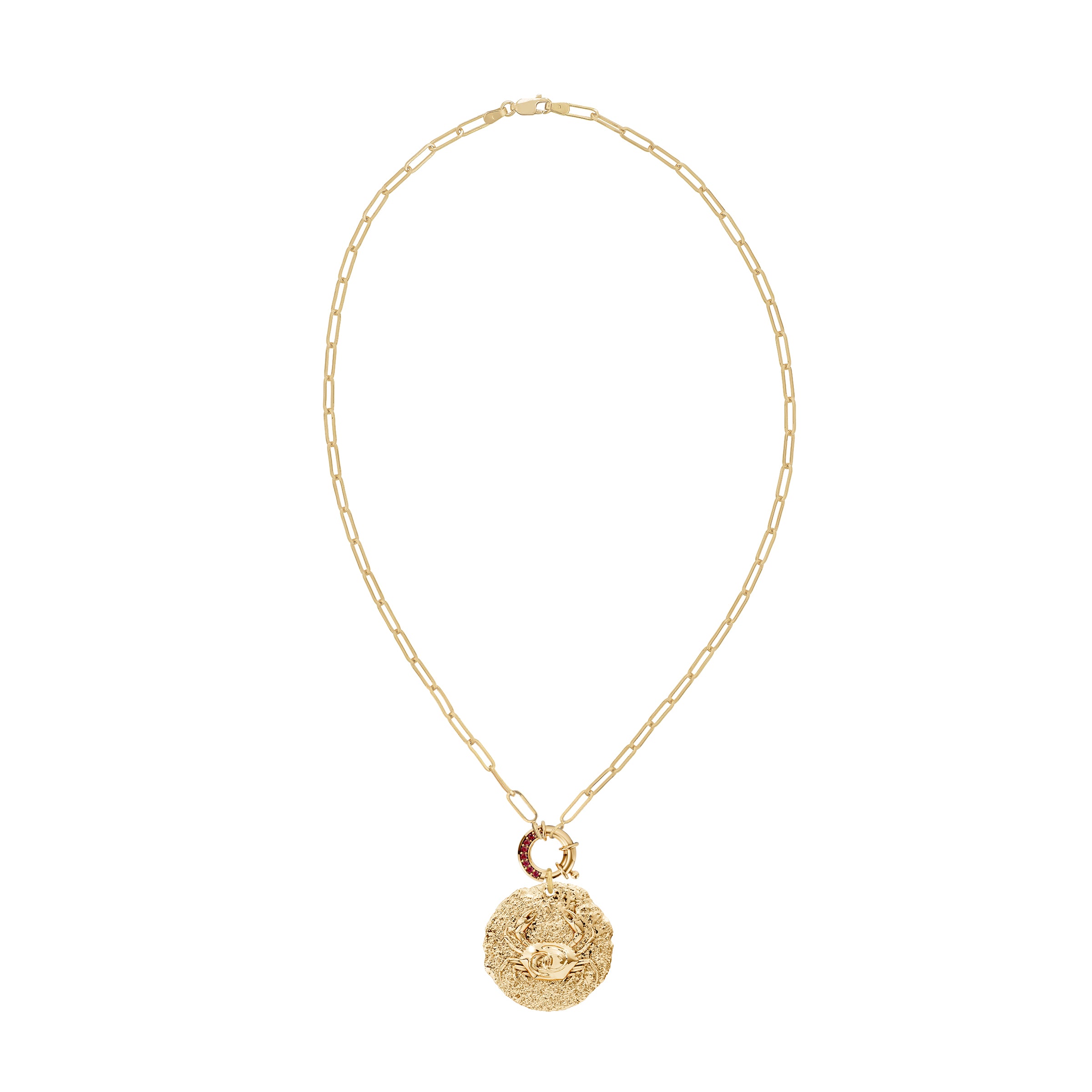 Gold necklace with a round zodiac cancer pendant with crab design on ruby decorative clasp on a white background
