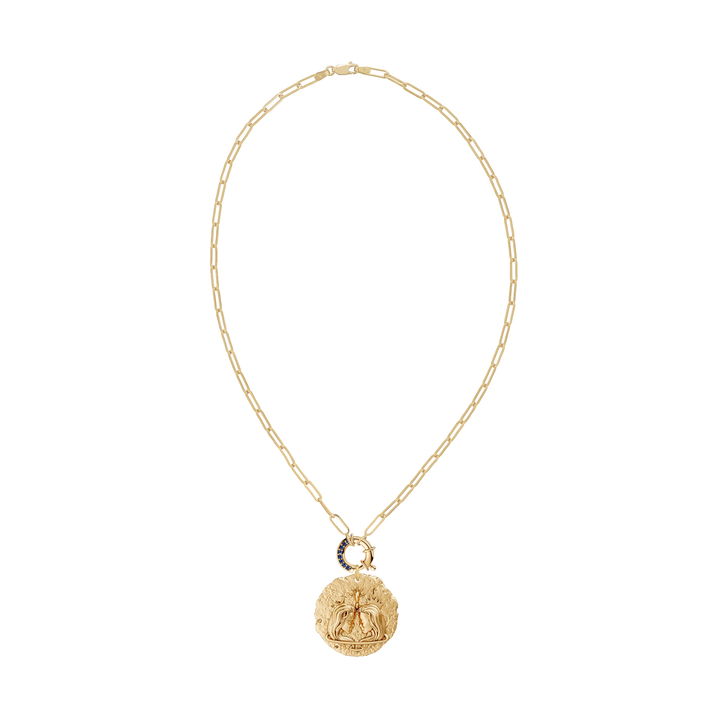 Gold necklace with a round gemini zodiac on pendant blue sapphire clasp on a white background