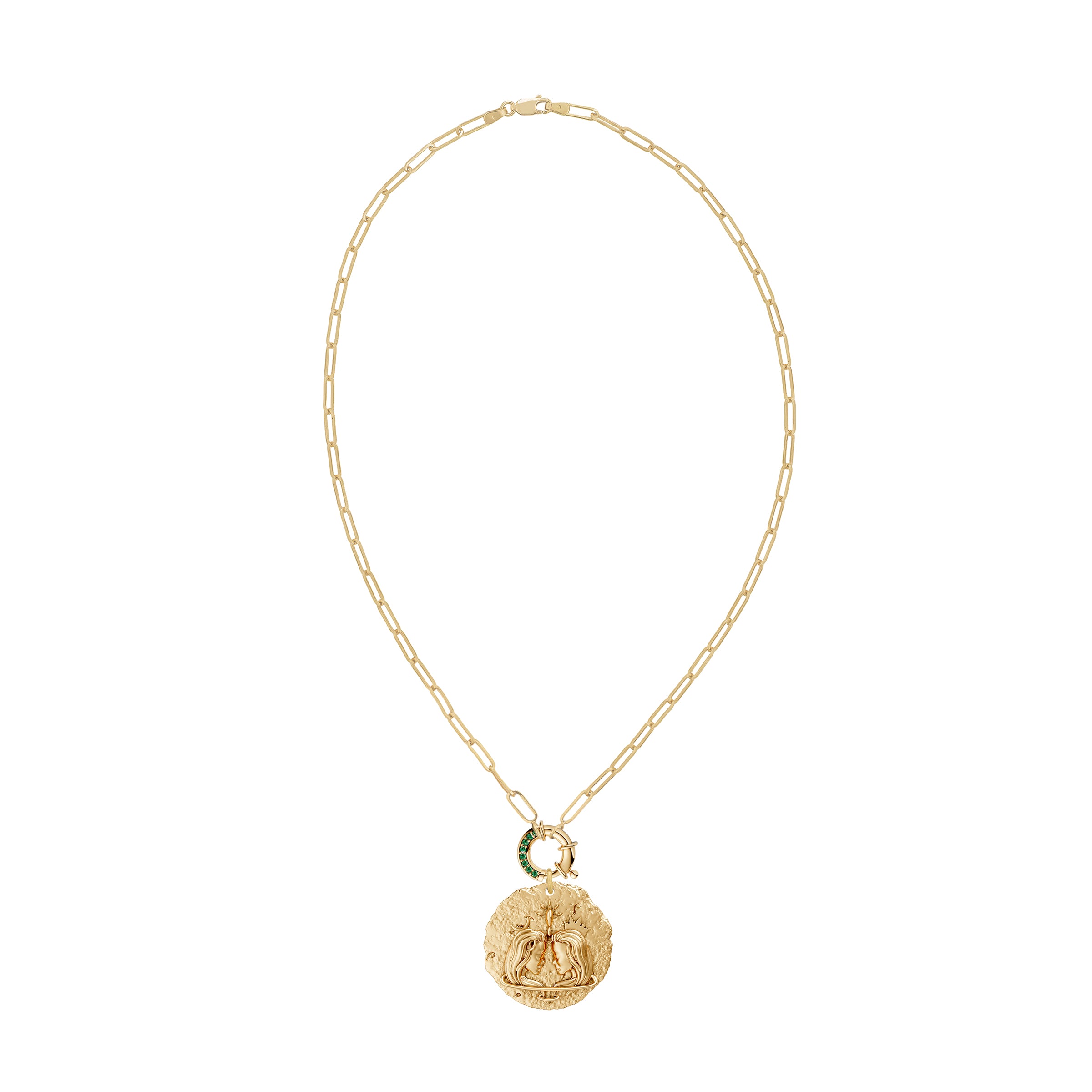 Gold necklace with a round gemini zodiac on pendant emerald clasp on a white background