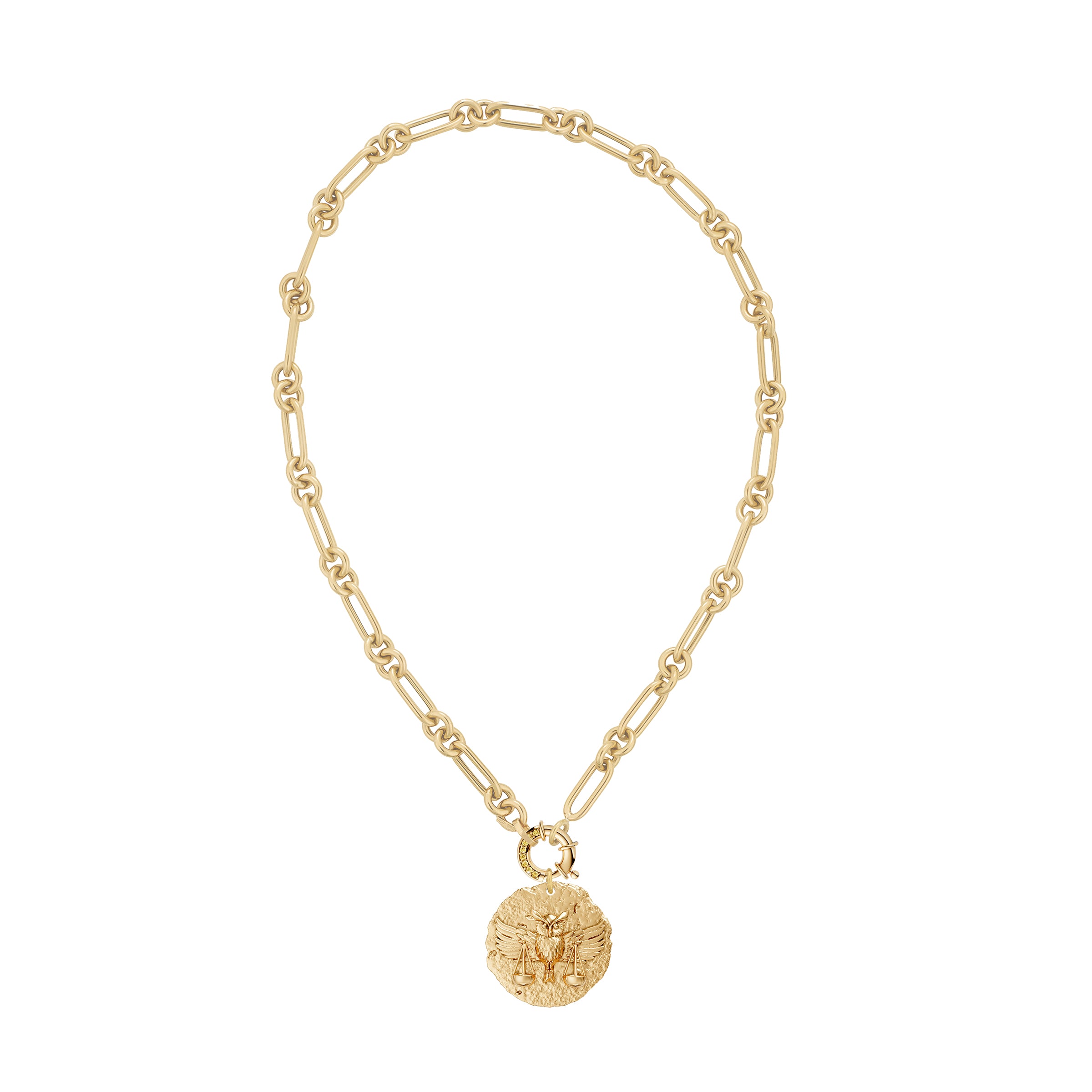 Gold necklace with a round zodiac libra pendant on link chain with decorative yellow diamond clasp on a white background