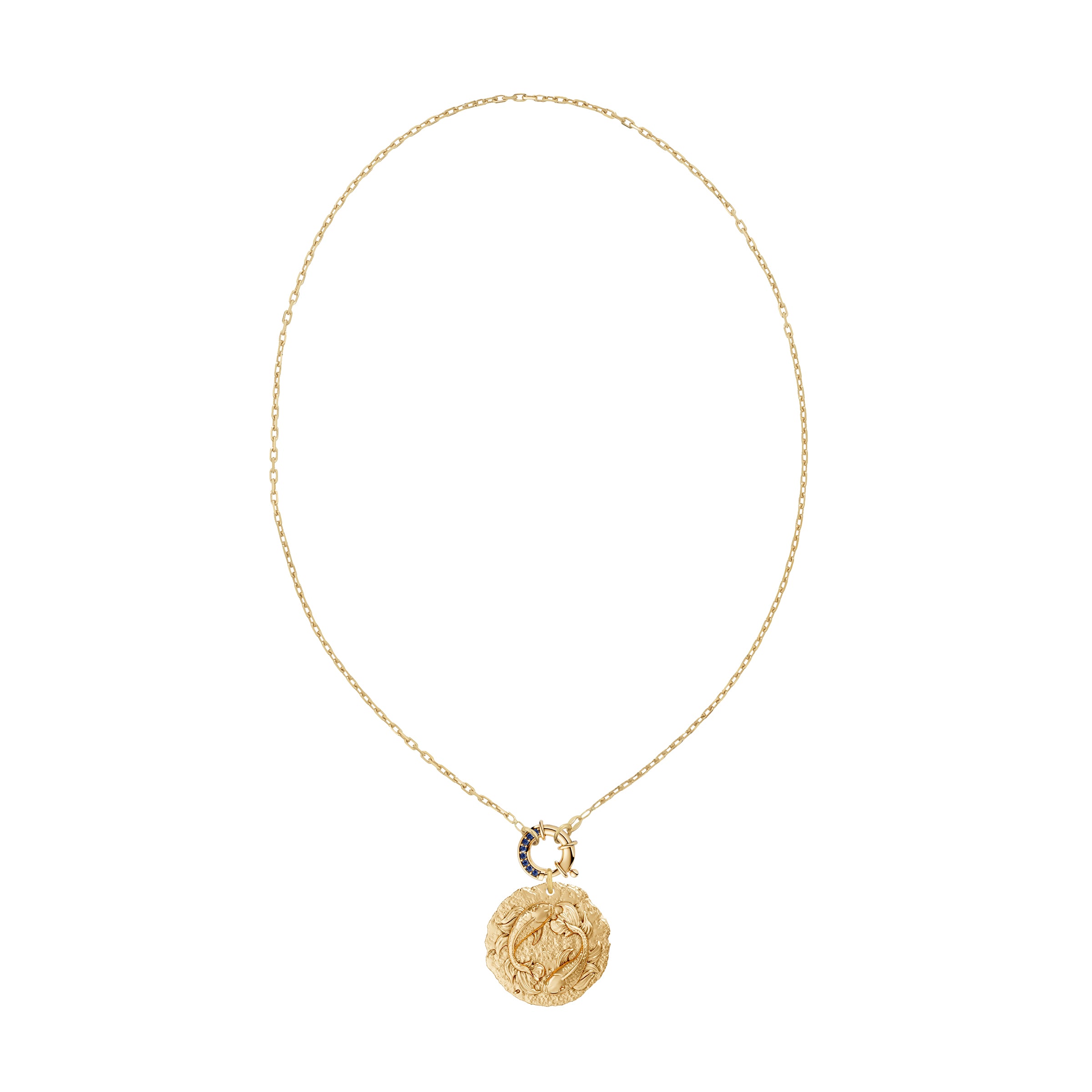Gold chain necklace with a round Pisces Zodiac pendant on blue sapphire clasp on a white background
