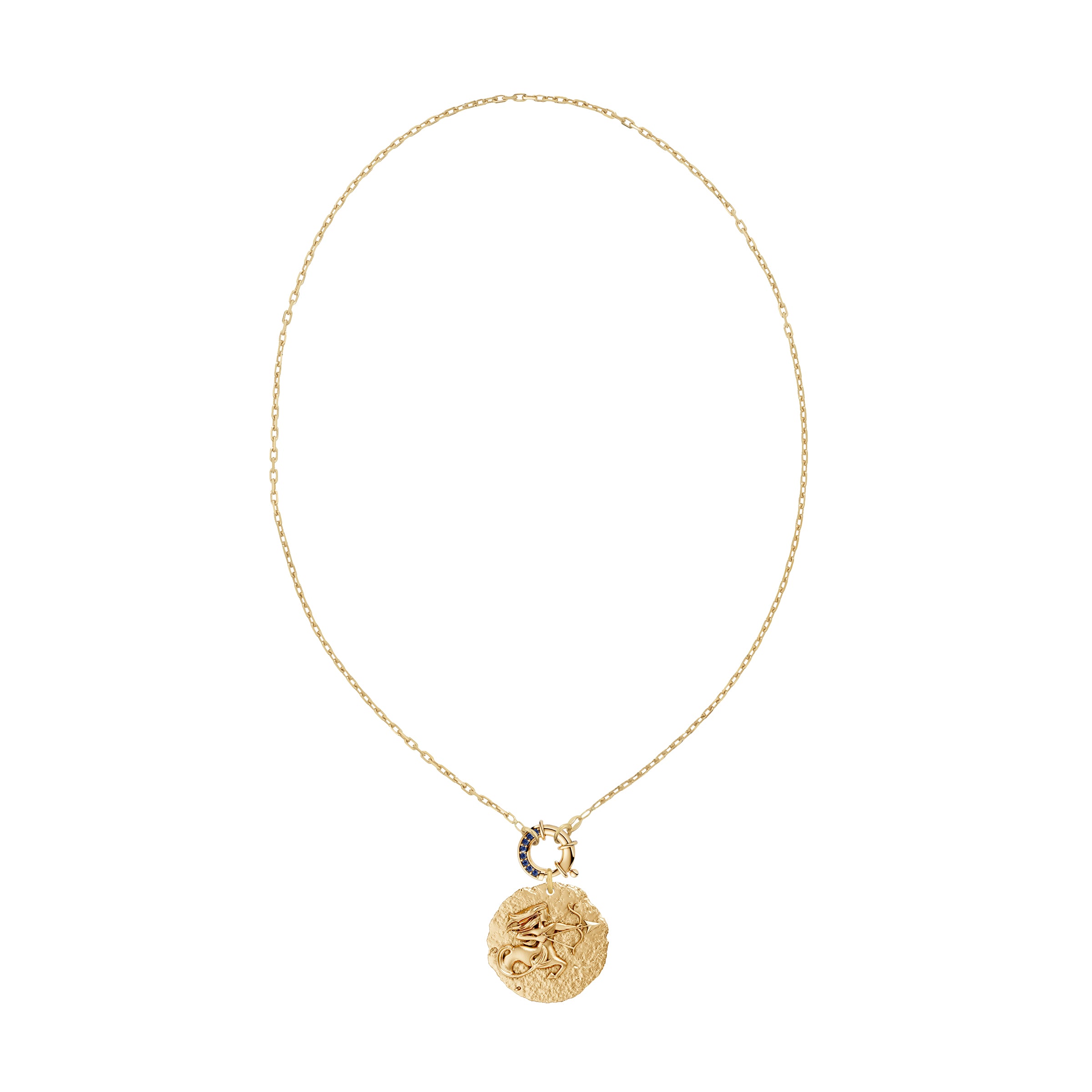 Gold necklace with a circular zodiac Sagittarius pendant on a small link chain and a blue sapphire clasp on a white background