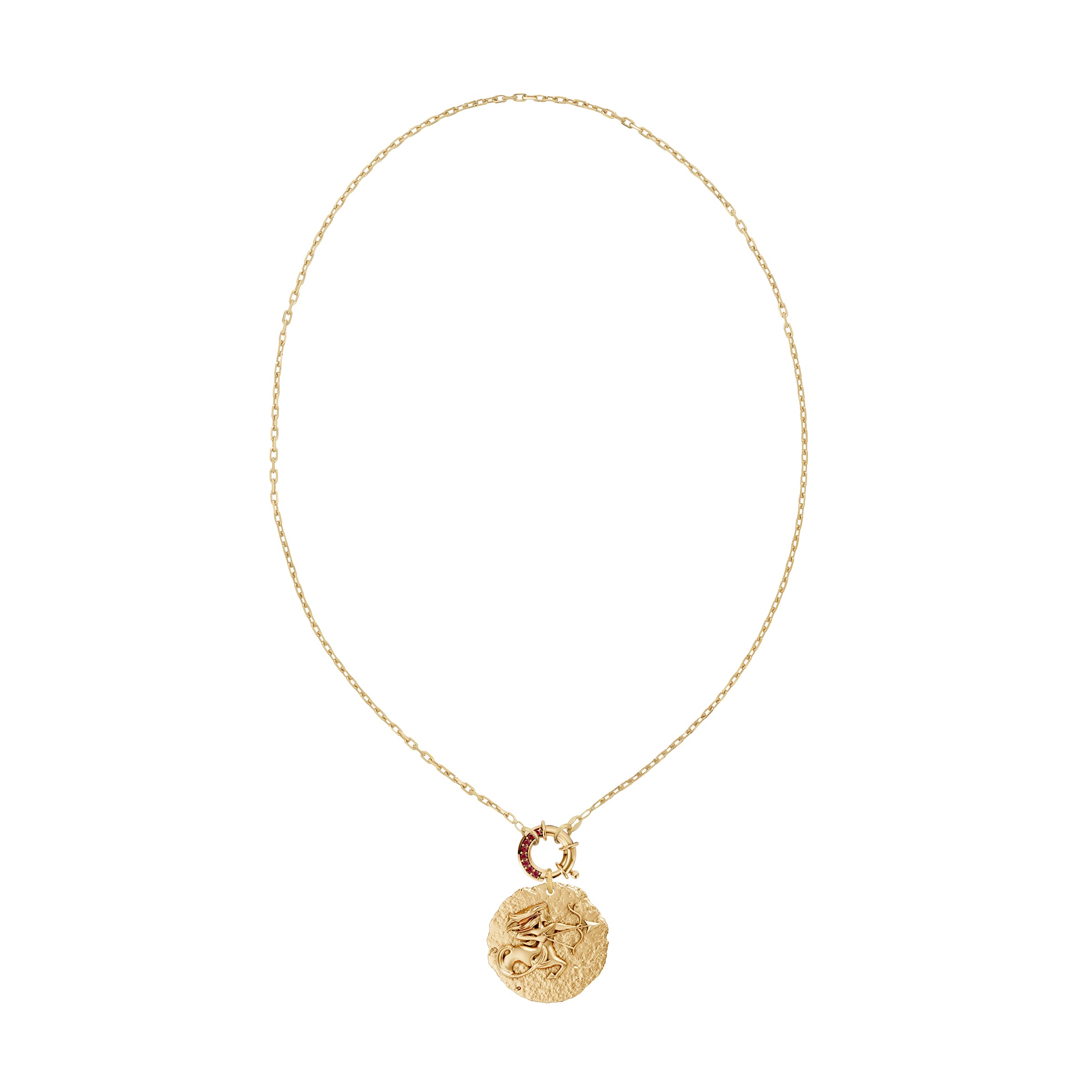 Gold necklace with a circular zodiac Sagittarius pendant on a small link chain and a ruby clasp on a white background