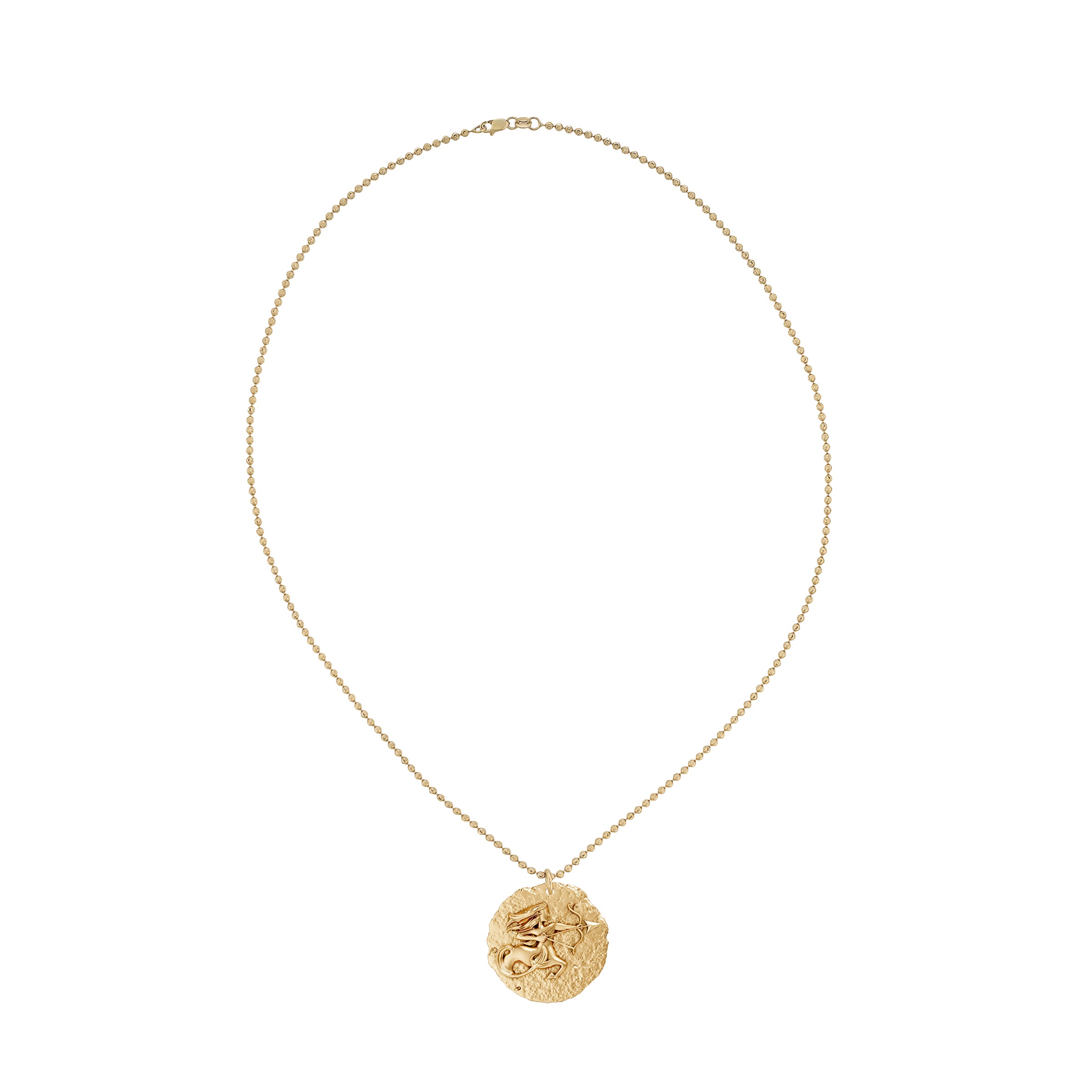 Gold necklace with a circular zodiac Sagittarius pendant on a small ball chain  on a white background