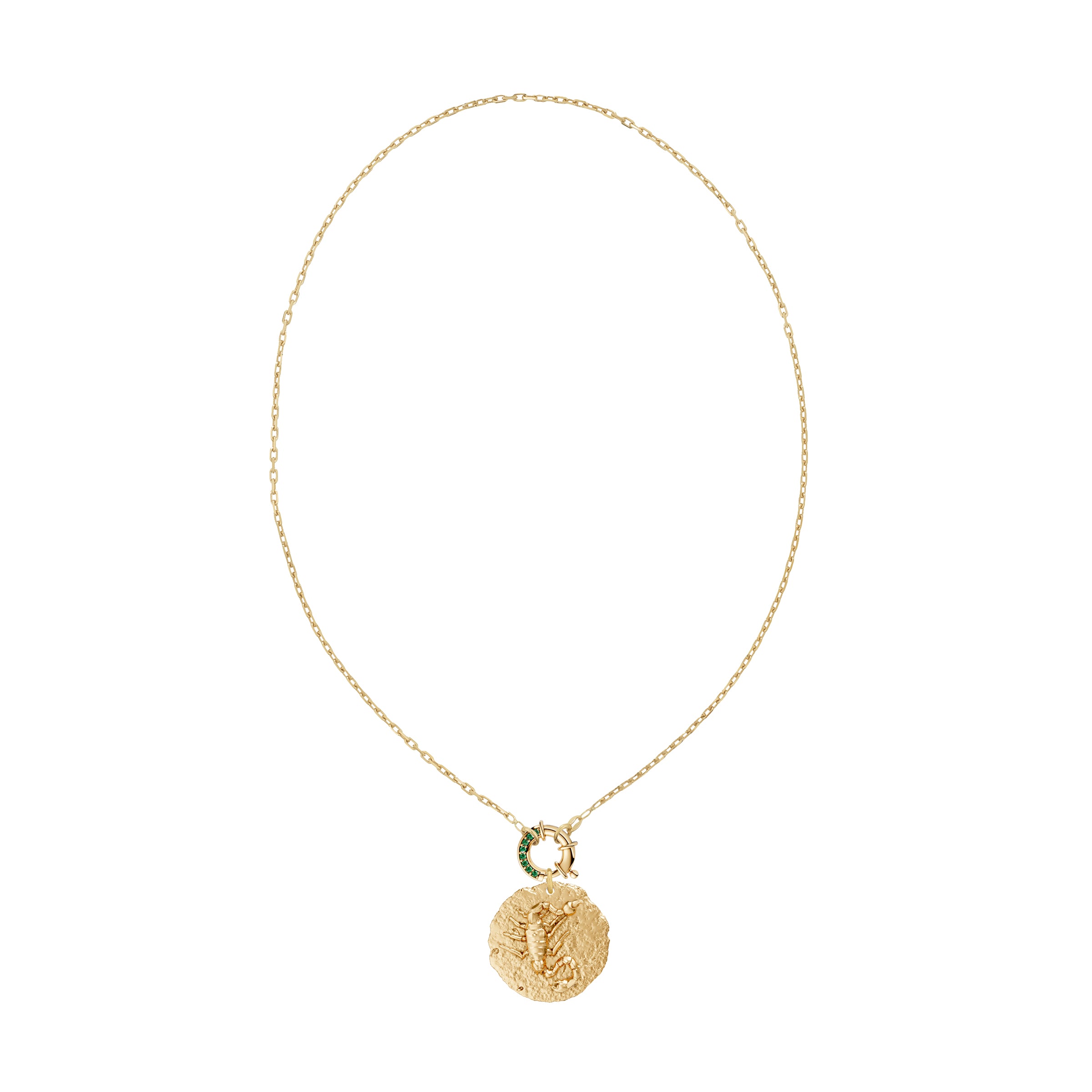 Gold necklace with a circular zodiac scorpio pendant on small link chain and emerald clasp on a white background
