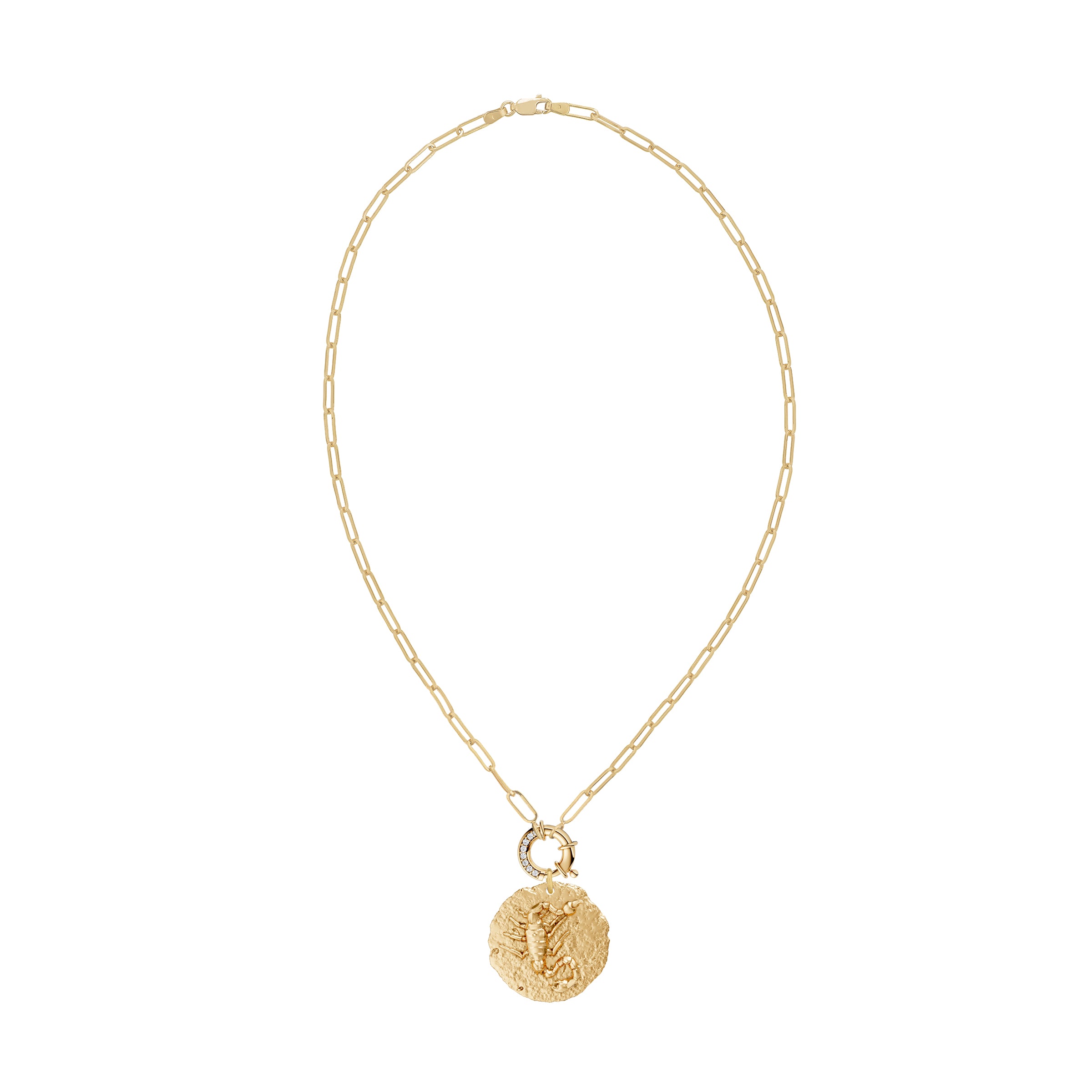 Gold necklace with a circular zodiac scorpio pendant on small link chain and white diamond clasp on a white background