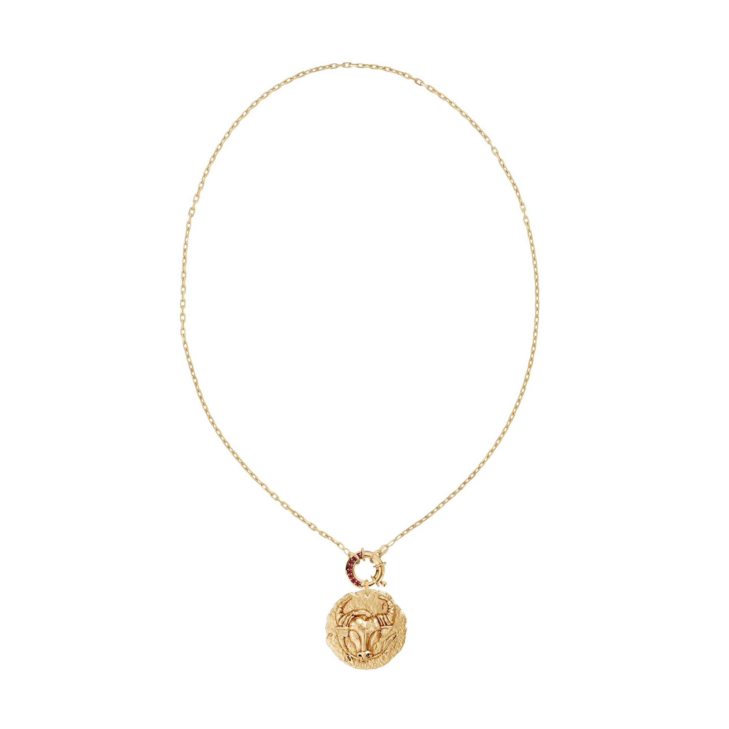 Gold necklace with a taurus zodiac  pendant and a ruby decorative clasp on a white background
