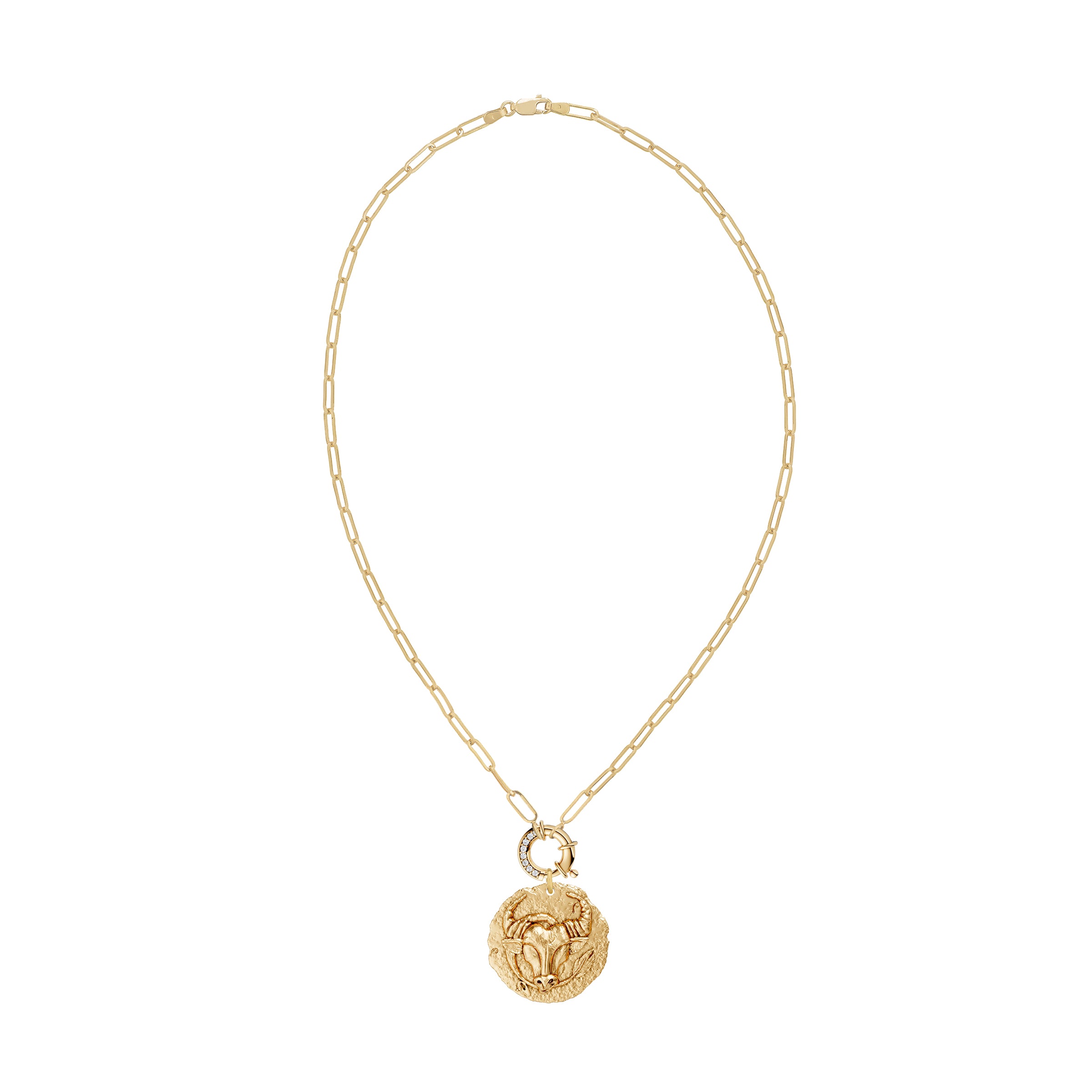 Gold necklace with a taurus zodiac  pendant and a white diamond decorative clasp on a white background