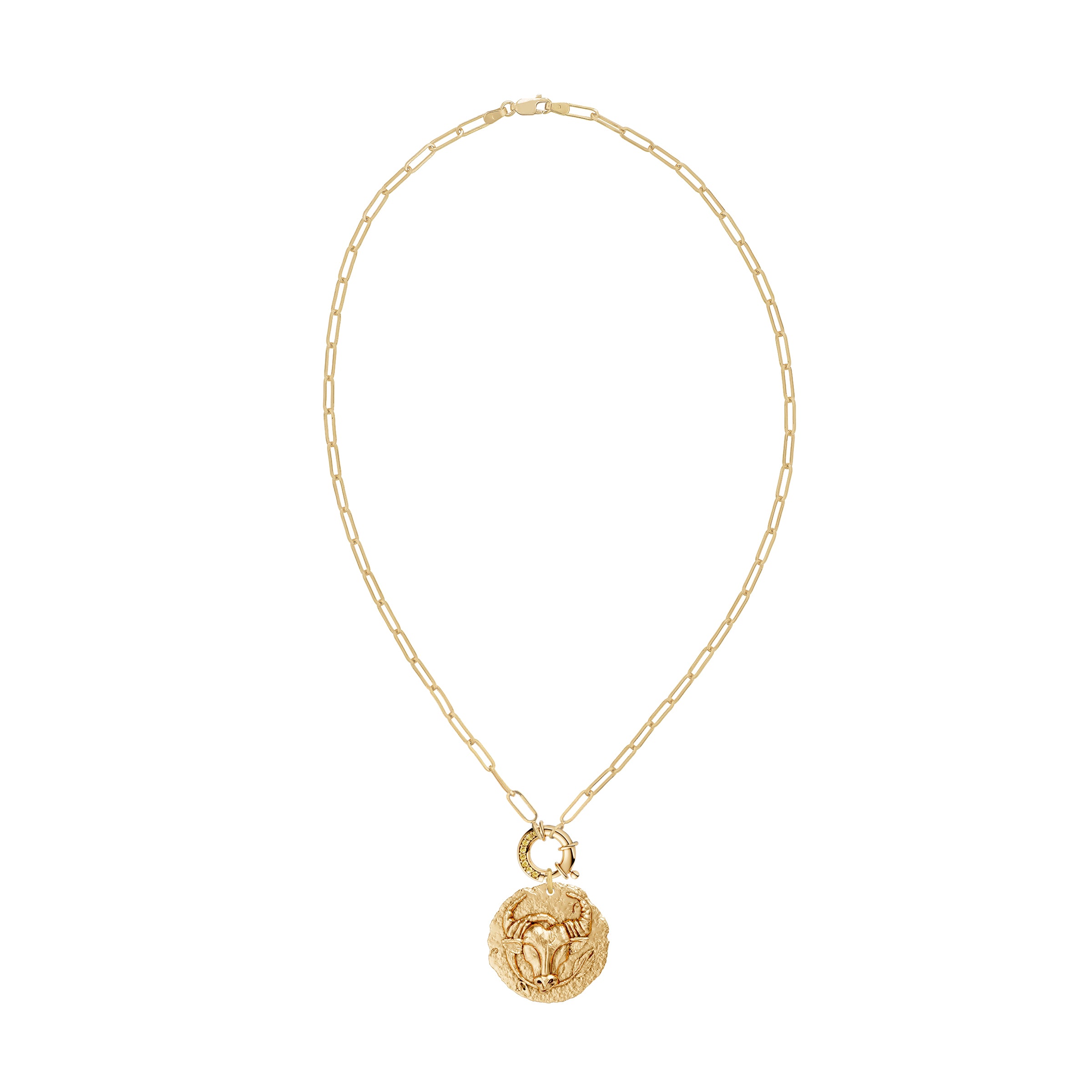 Gold necklace with a taurus zodiac  pendant and a yellow diamond decorative clasp on a white background