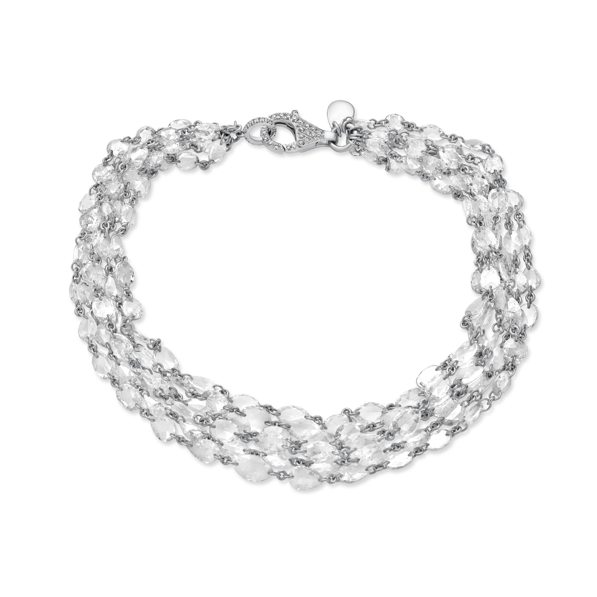 Multi-strand bracelet featuring rows of rose-cut diamonds linked together with 18k gold, finished with a pavé-detailed clasp.