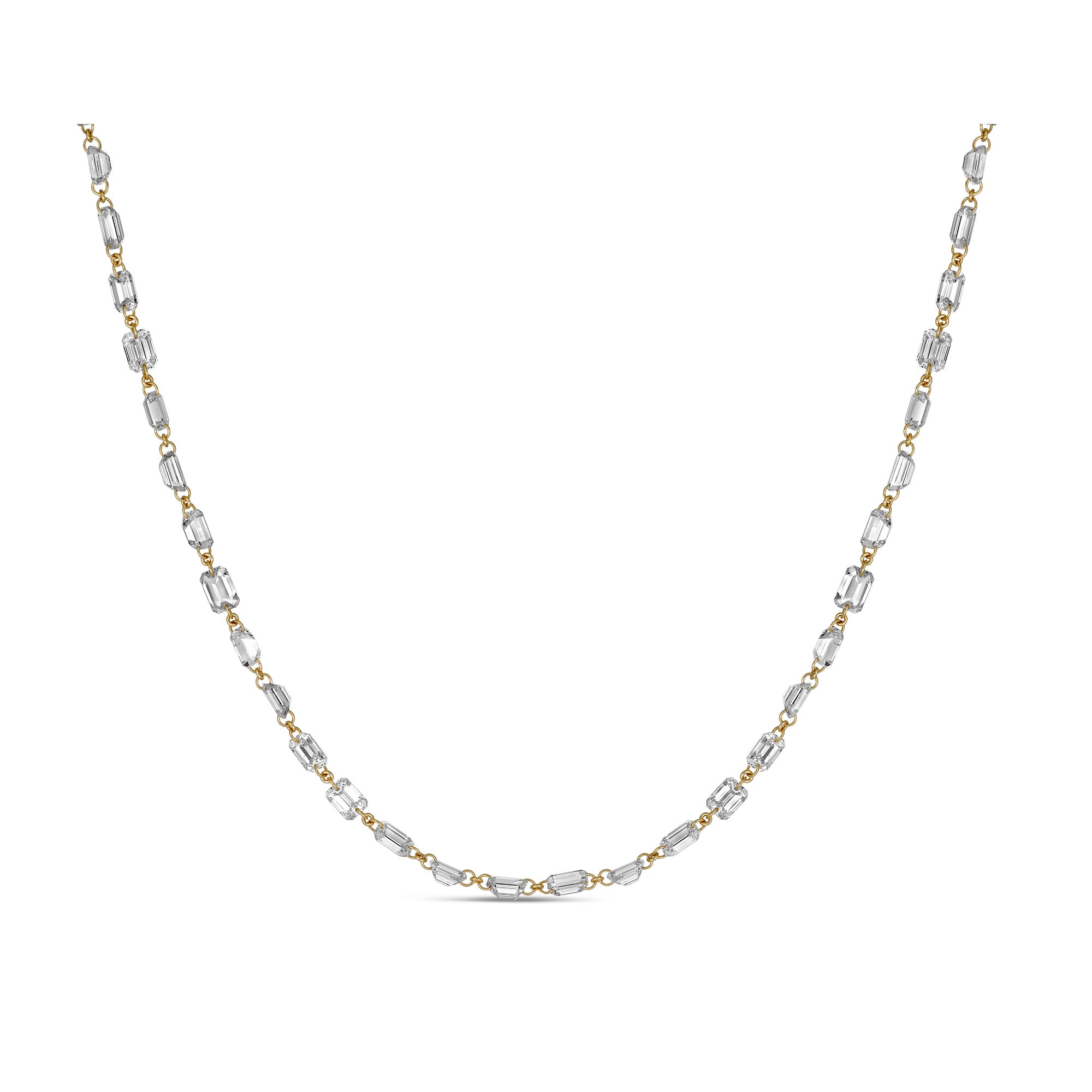18k gold station necklace featuring baguette-cut diamonds evenly spaced along the chain, shown in a double strand style.