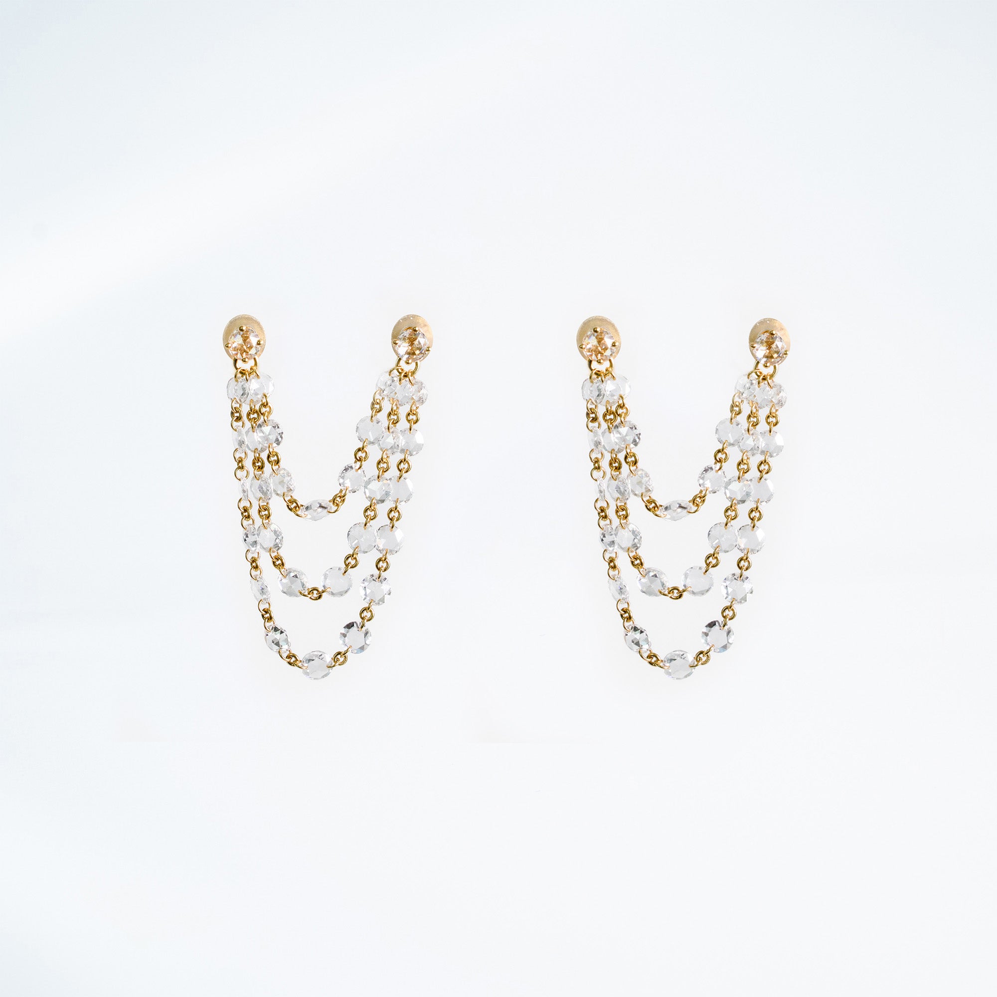 Pair 18k yellow gold dangle 3 strand earrings.  Rose cut natural mined diamonds on chain to create a drapping effect. 