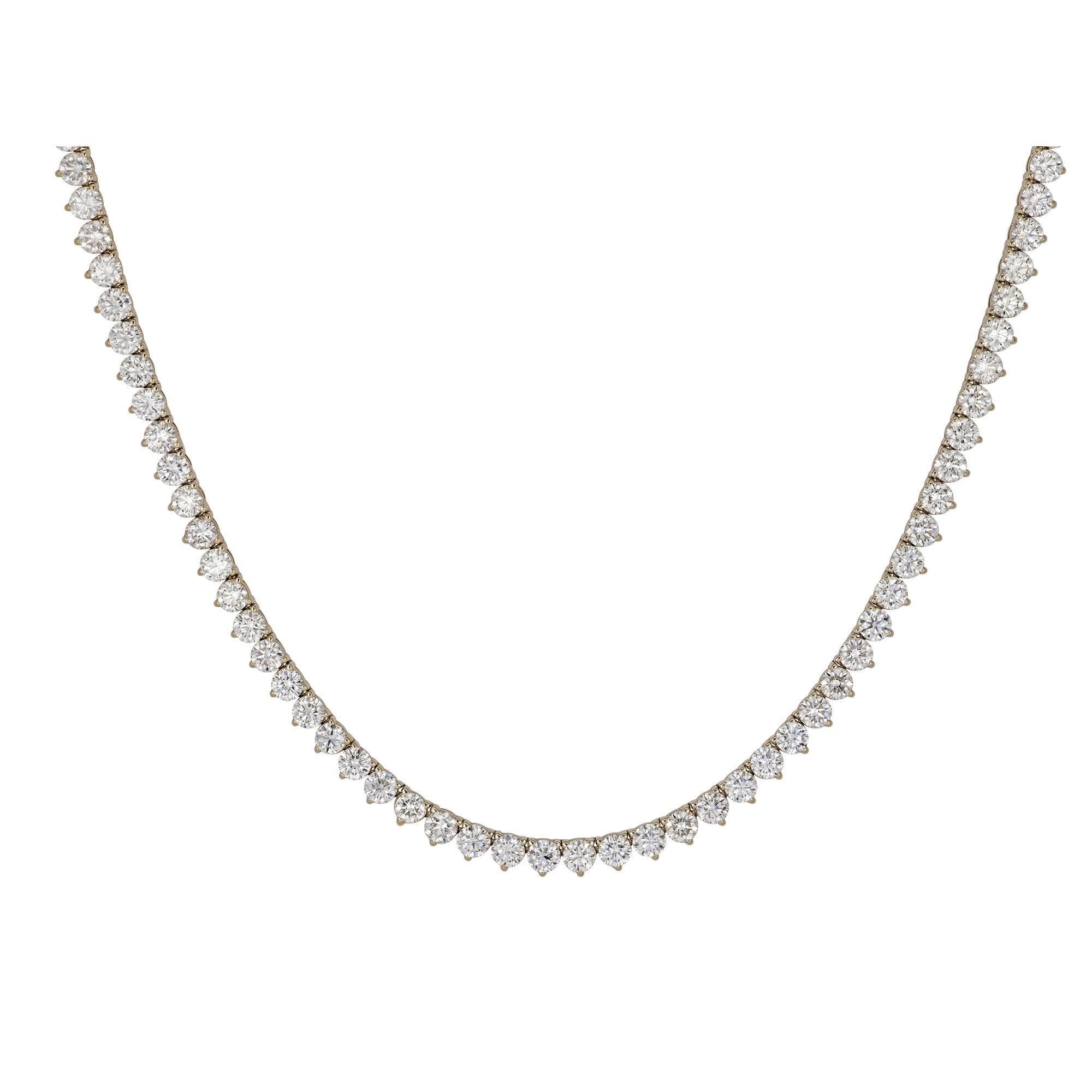 Diamond tennis necklace set in yellow gold on a white background